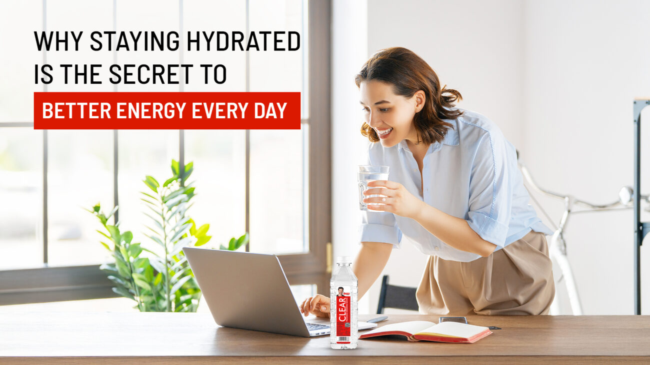 Person drinking Clear Pani bottled water to stay hydrated and energized